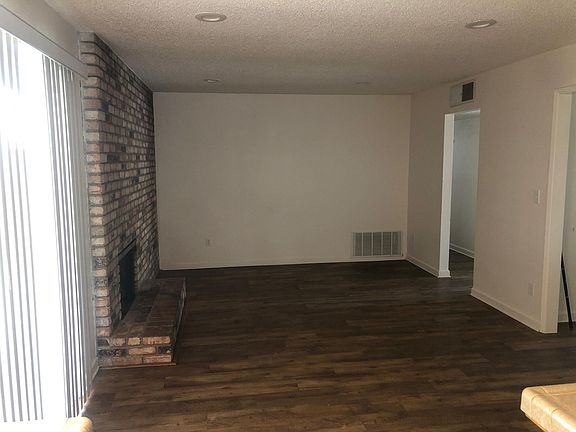Family room with wood burning fireplace
