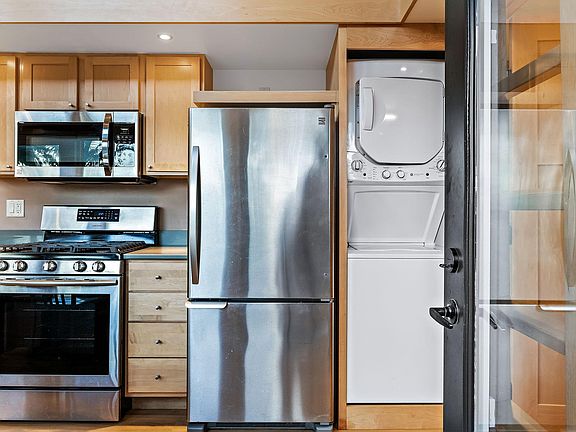 Gourmet Kitchen with Gas Range + Laundry Center