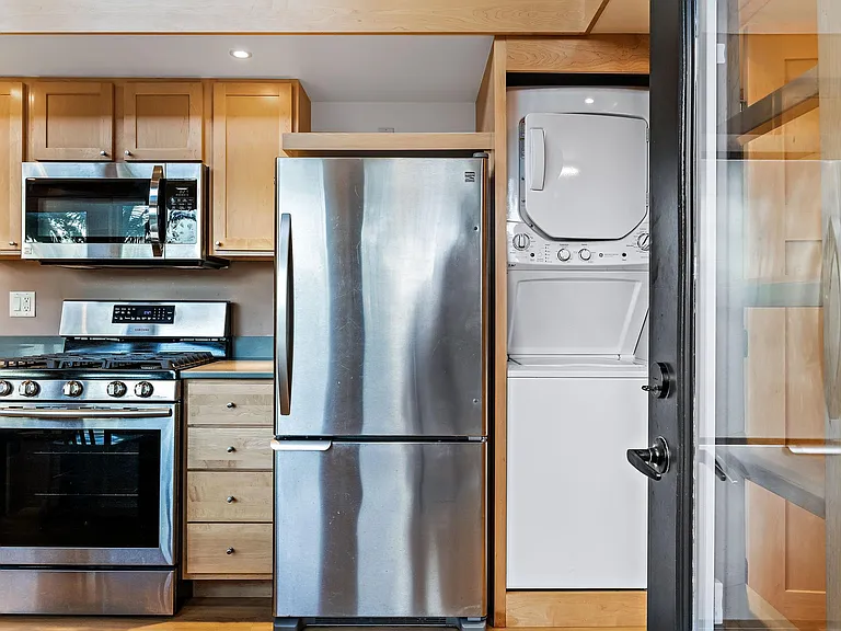 Gourmet Kitchen with Gas Range + Laundry Center