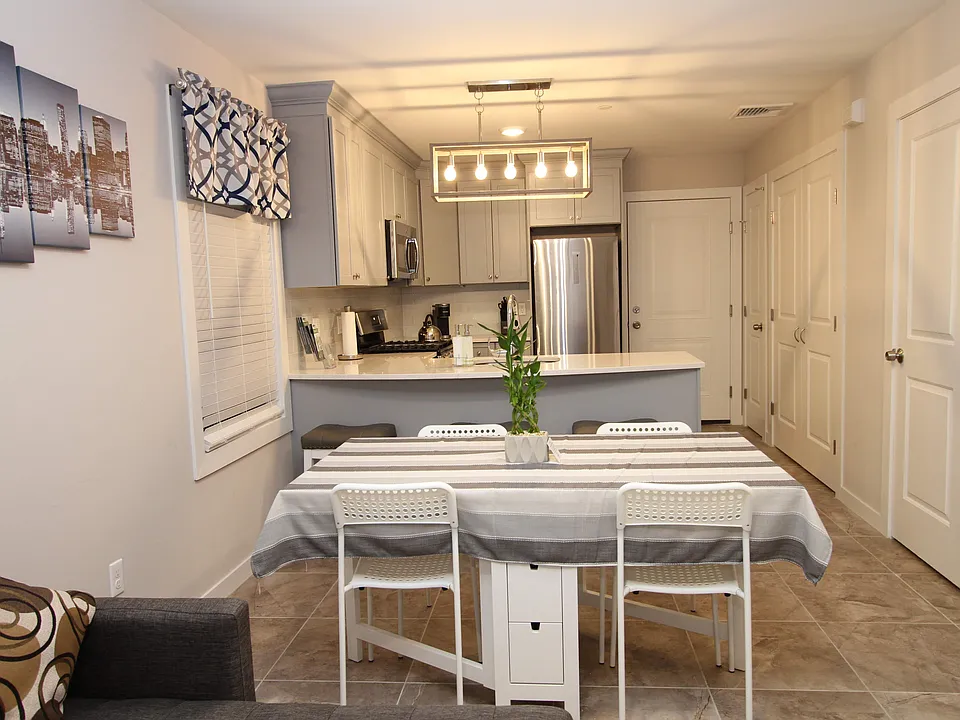 Open layout view connecting dining and kitchen spaces.