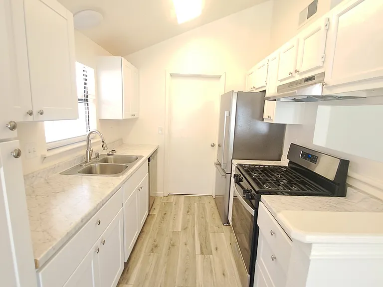 Kitchen - back door leads to Garage