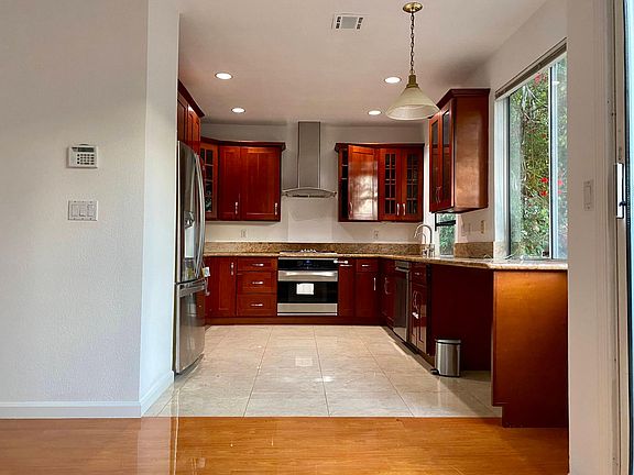 Kitchen with all stainless steel appliances