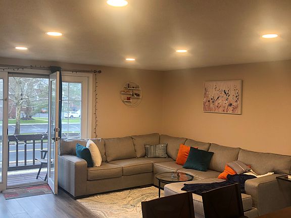 Living room with new flooring and led lighting
