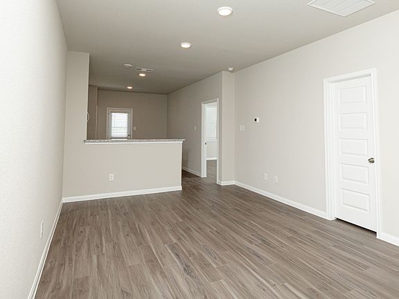 Family Room to Kitchen and Dining Area