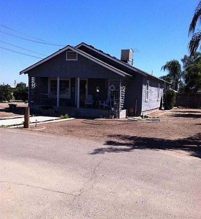ALTERNATE VIEW OF THE HOME WITH NICE COVERED ENTRY PORCH.