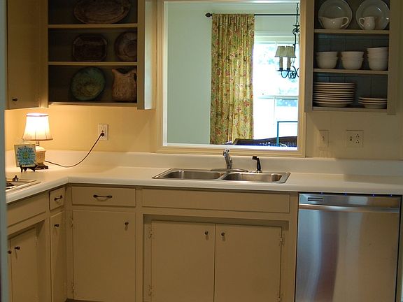 Updated Kitchen with Stainless Steel Dishwasher and Recessed Lighting