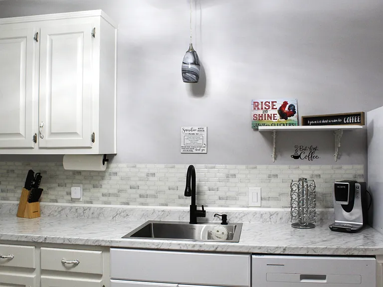 Small appliances available for use are an air fryer, toaster and a coffee maker.
