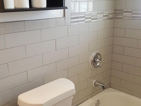 new tile floor and walls