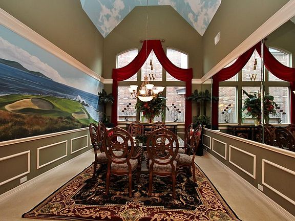 Majestic and spectacular Formal Dining Room offers an expansive room that can easily set twelve! A c