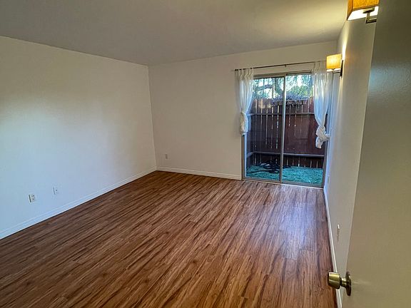 Large bedroom with patio entrance.