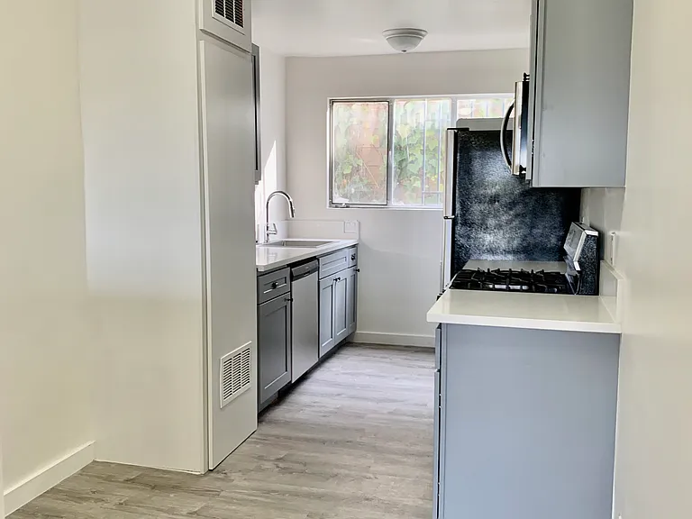 kitchen - stainless steel appliances, w/d, dishwasher, range, over the range microwave