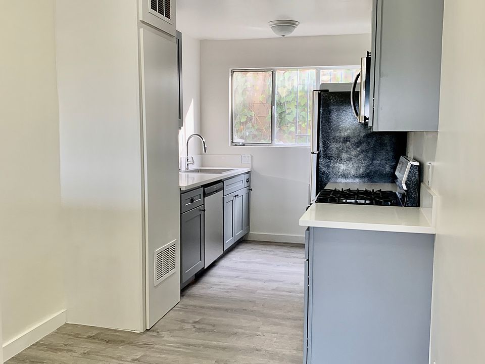 kitchen - stainless steel appliances, w/d, dishwasher, range, over the range microwave