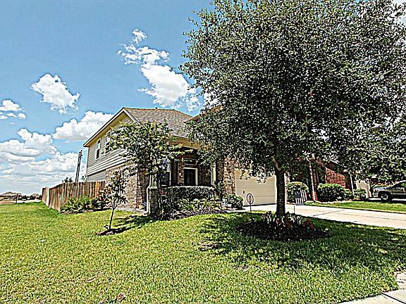 THIS LOVELY HOME ALSO BOASTS NO SIDE NEIGHBORS.