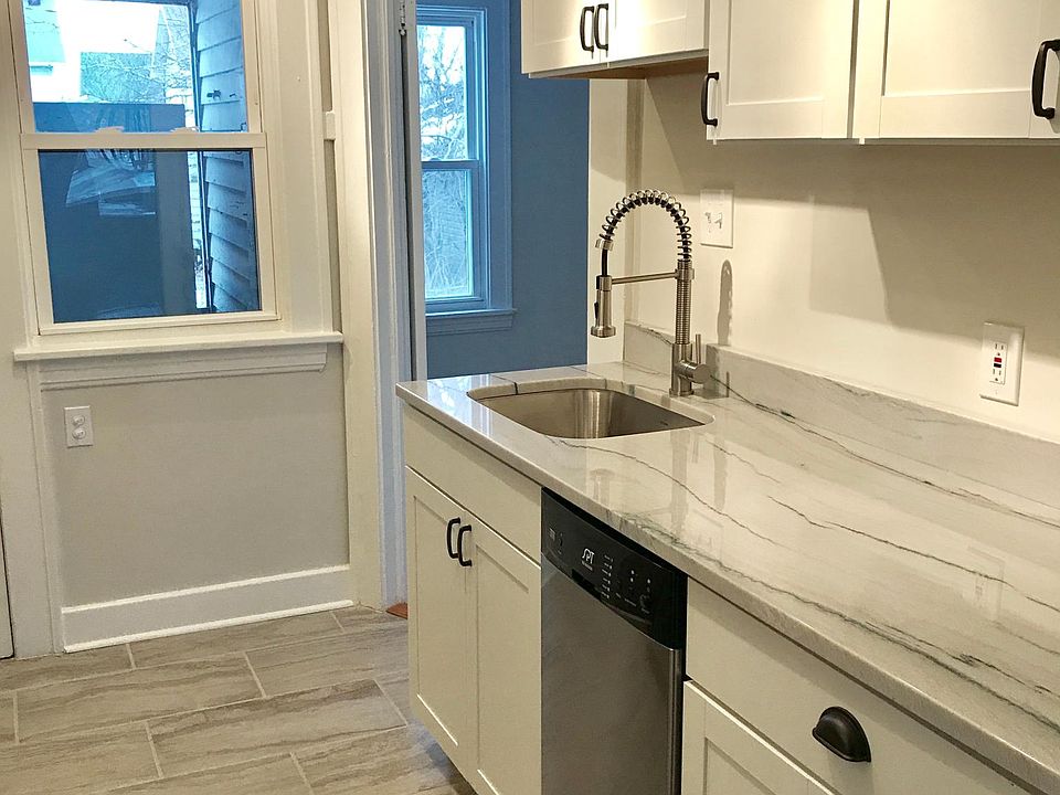 Quartzite Stone & Ceramic Tile Floor