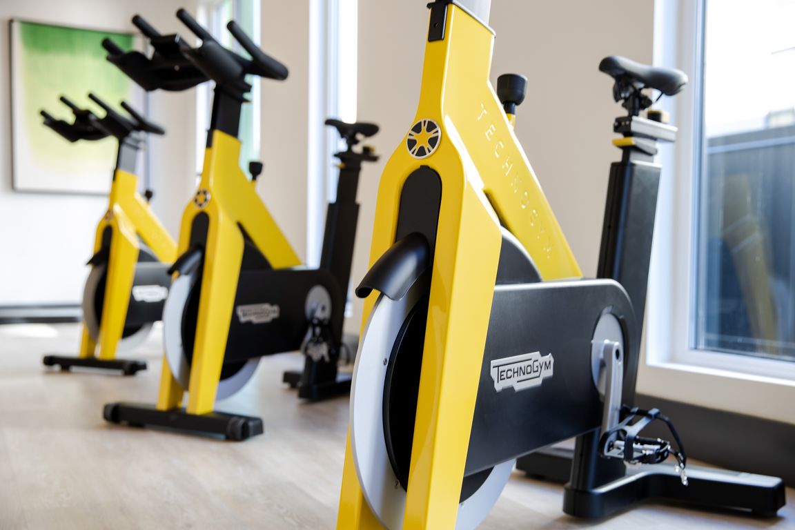 Pedal toward your goals in a vibrant, high-energy spin studio.