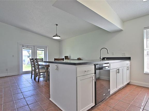 4th image of 6657 Stewart Ave N