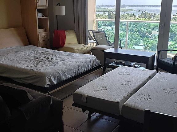 Both Murphy beds opened up for sleeping 4 people.