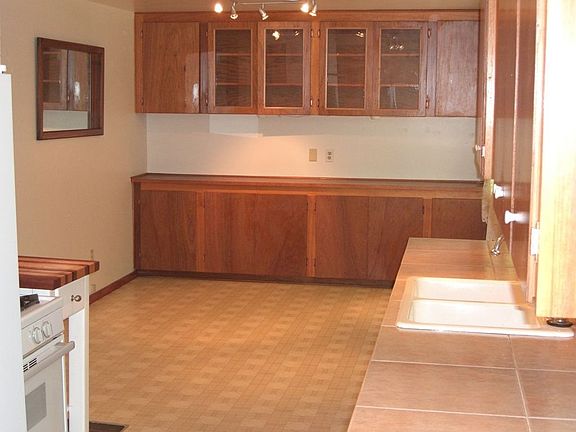 Large Kitchen w/ spacious eating space & ample cabinets 