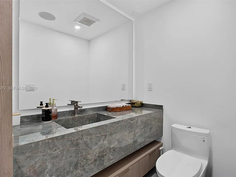 645 NE 53rd St — Photo 35