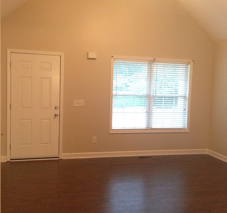 Living room with vaulted ceiling