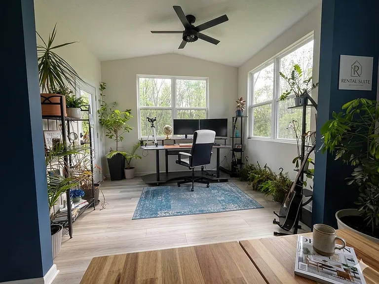Sunroom that opens onto deck