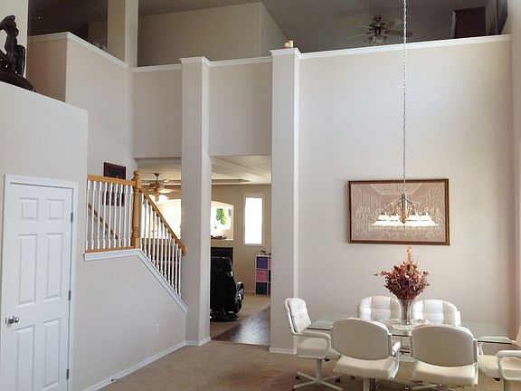 As you enter you are greeted with 25' ceilings and a combined dining and living room. All which can be viewed from the loft above.