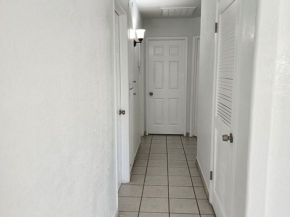 Hallway (Includes closet and storage cabinet)