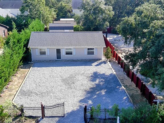 2nd image of 4403 E Oak Island Drive Lot 2