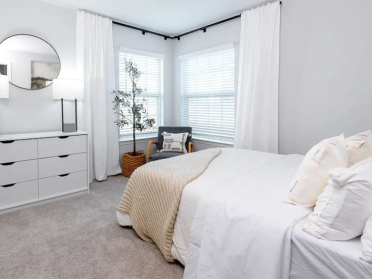 Discover unparalleled comfort in our serene bedroom sanctuaries, where plush carpeting, ample windows, and meticulously designed closets offer an elevated living experience.