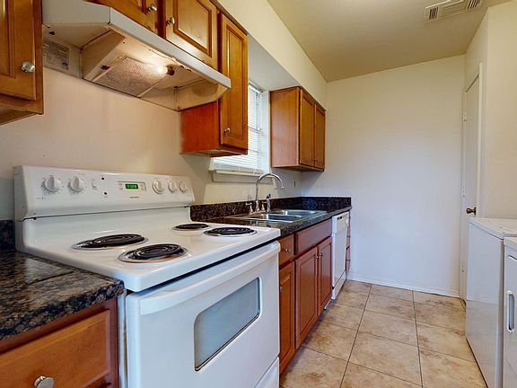 Kitchen with granite countertops and new cabinetry