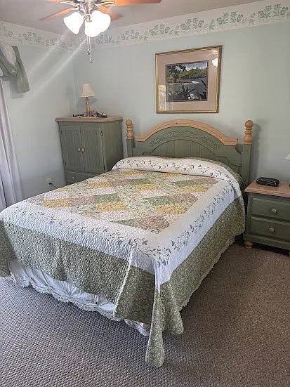 Master bedroom with queen bed.