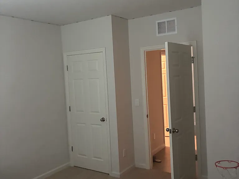 Bedroom 3 closest to the bathroom , laundry and garage.