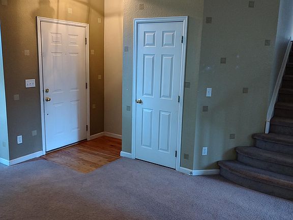 Living Room with Front Entry door and Coat Closet