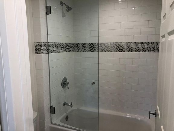 Shower along with bathtub