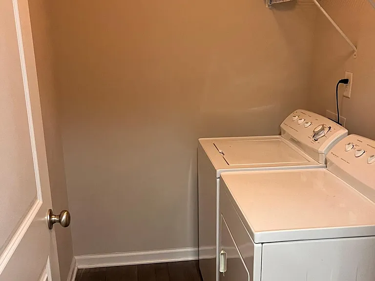 Laundry with washer and dryer included and plenty of space.