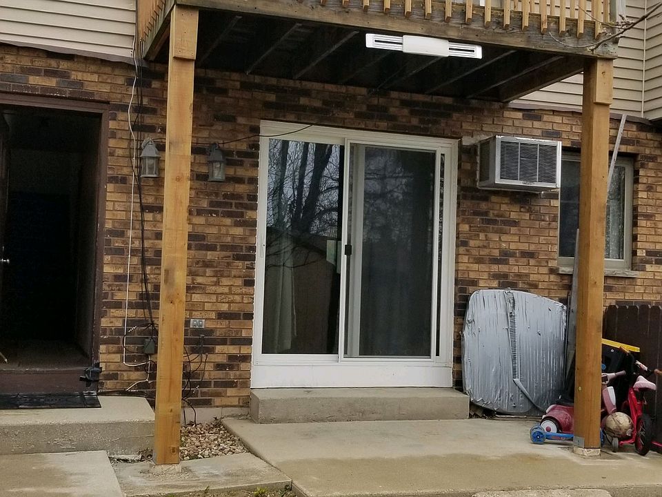 Upstairs apartment has balcony.