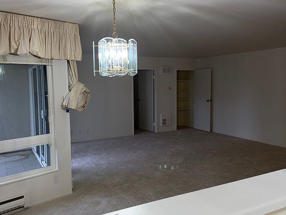 from Kitchen looking into dining and living room area,