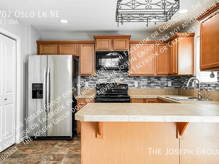 8707 Oslo Ln NE — Photo 6