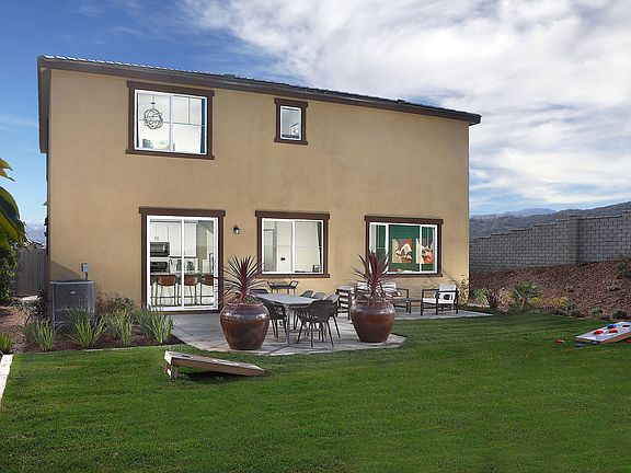 Enjoy outdoor activities in the spacious backyard area.