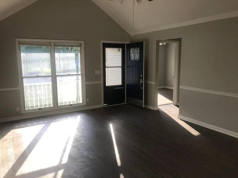 Looking at the front door. The opening by the front door leads to Bed1, Bath1, and Bed 2