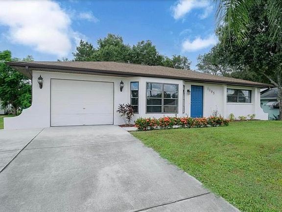 Front side with a garage