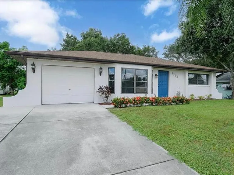Front side with a garage