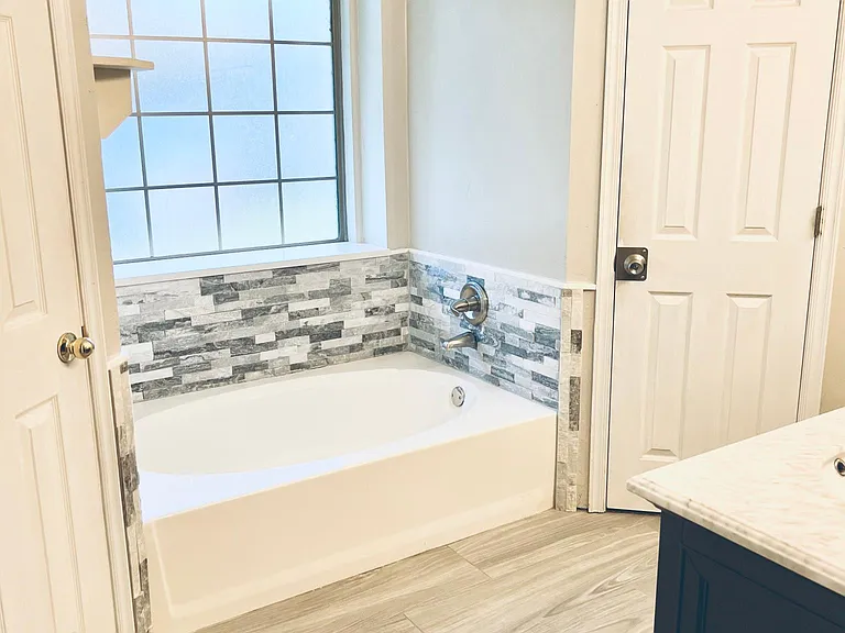 Master bathroom with 2 walk in closets