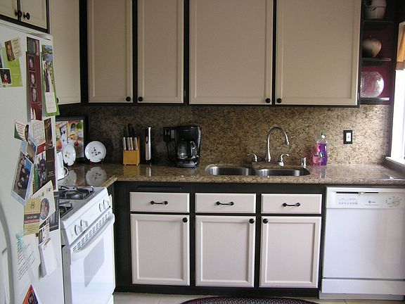 Kitchen with newer appliances and granite counter tops