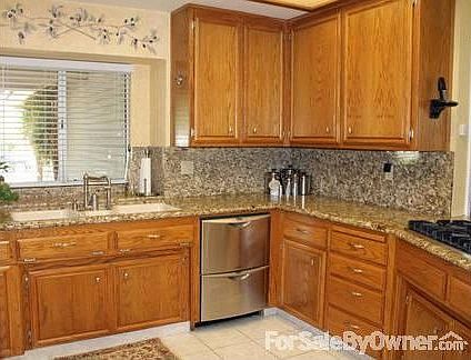Updated Kitchen : Granite counters and backsplash. Fisher Paykel dish drawers