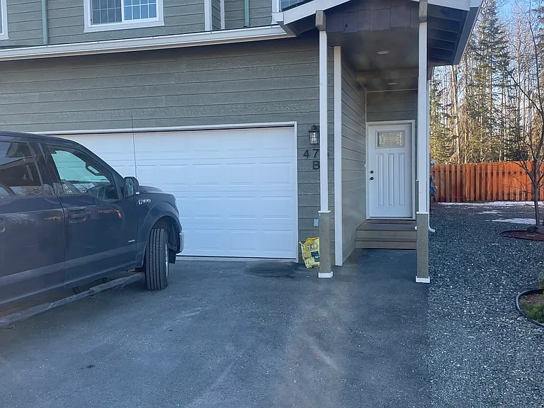 Corner Unit. 2 car heated garage.