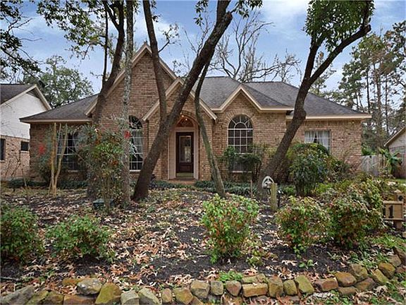 Spacious kitchen with hardwood floors.