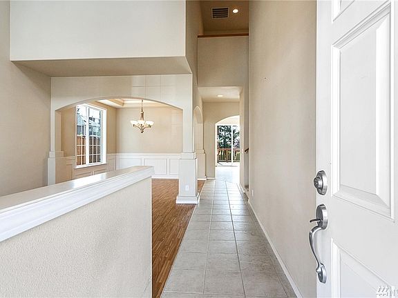 Main entry into the living room and formal dining area. 