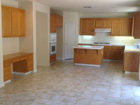 Tile Floors all professionally steam cleaned.  Desk for downstairs office area.