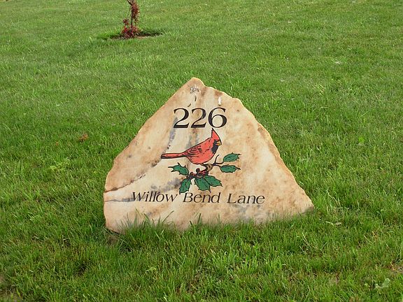 Sign in front of house